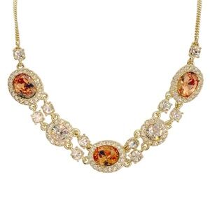 Givenchy Elegant Amber tone gold and necklace.